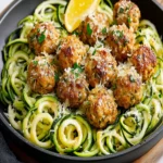 Garlic Butter Meatballs over Zucchini Noodles First Image First Image